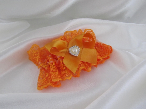 оранжевые свадебные подвязки фото