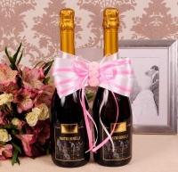 розовый бант на двебутылки свадебного шампанского