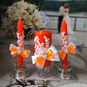 оранжевые свадебные свечи фото