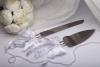 нож и лопатка для свадебного торта с белыми бантами